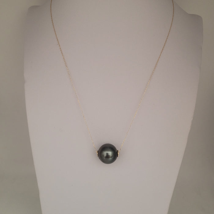 A Tahiti Pearl Floating Pendant of a large size of 13 mm 18K Yellow Gold