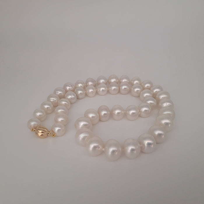 White South Sea Pearls 9-12 mm with high luster 18K Gold clasp