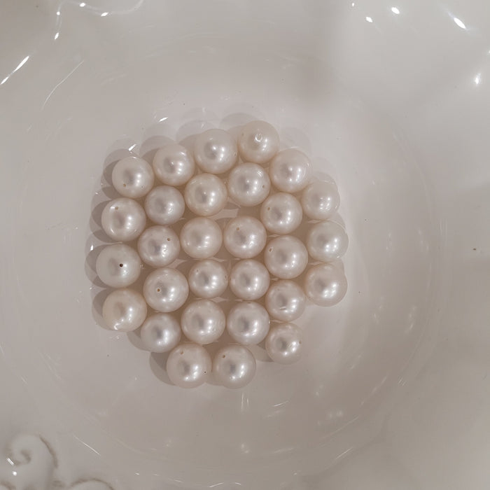 White South Sea Pearls 11 - 12 mm Round Grade 1