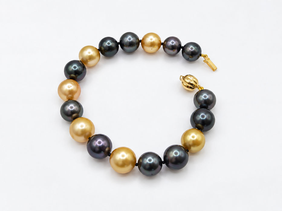 Bracciale con perle di Tahiti e perle dei Mari del Sud dorate, chiusura in oro massiccio 18 carati