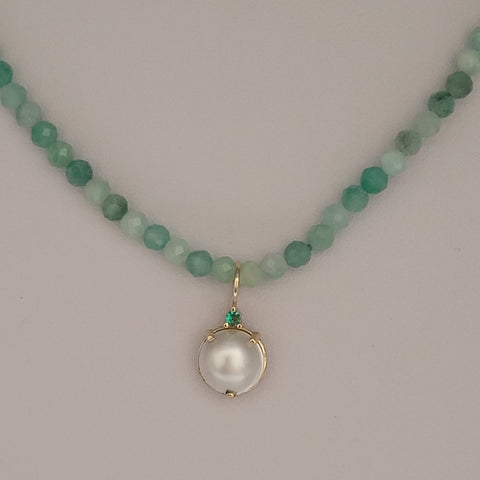 Mabe pearl and green-stone necklace, front view with a central white pearl pendant