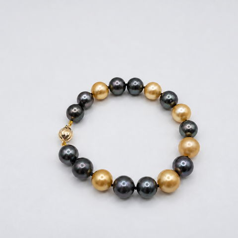 Bracciale con perle di Tahiti e perle dei Mari del Sud dorate, chiusura in oro massiccio 18 carati