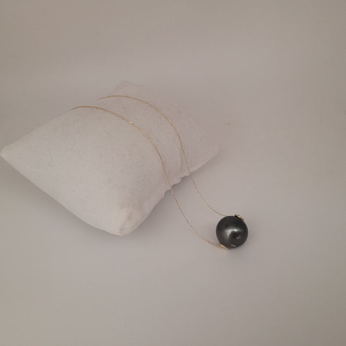 A Tahiti Pearl Floating Pendant of a large size of 13 mm 18K Yellow Gold