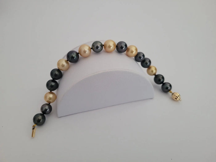 Bracciali con perle dei Mari del Sud dorate
