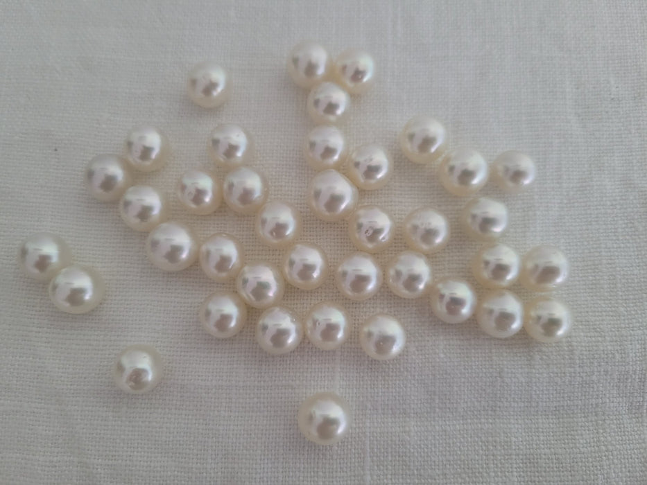 Wholesale Lot White South Sea Pearls 10 mm, 33 pieces of Very High Luster - Only at  The South Sea Pearl